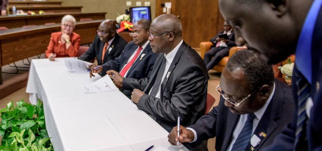 Ugandan judicial leaders signing the MOU with Pepperdine