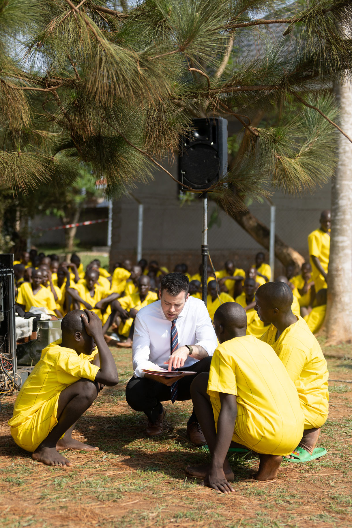 Lawyer reading to men